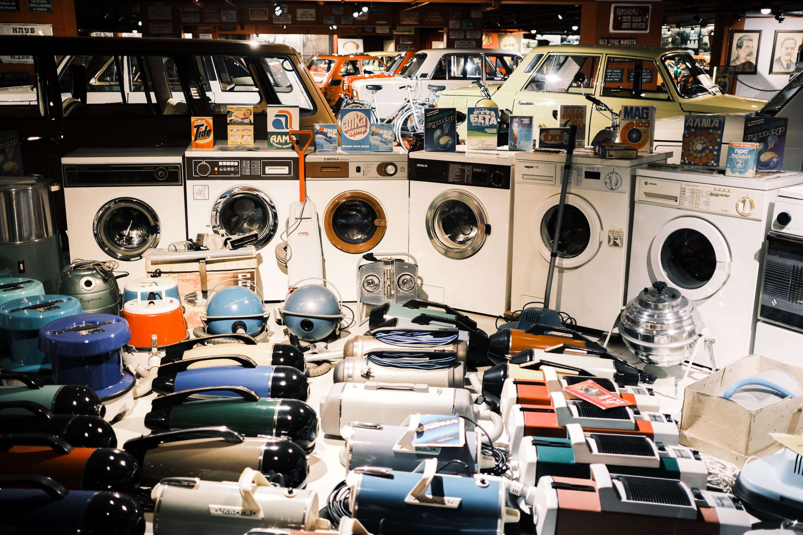 A nostalgic display of vintage washing machines and vacuum cleaners in a Bulgarian museum.